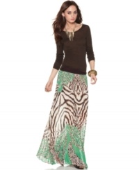 Lighten up with an on-trend, airy version of the classic maxi skirt. Andrew Charles mixes wild prints together for a unique look! Lighten up with an on-trend, airy version of the classic maxi skirt. Andrew Charles mixes wild prints together for a unique look!