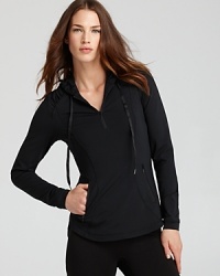 You'll love this easy-on hoodie featuring a cinched back for a customized fit to flatter your silhouette, subtle ruching for feminine flair and longer back hem for perfect coverage. You'll love this easy-on hoodie featuring a cinched back for a customized fit to flatter your silhouette, subtle ruching for feminine flair and longer back hem for perfect coverage.