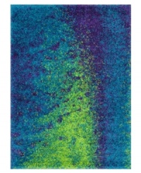 Make a strong textural and visual impact with the vibrant peacock blues and lime greens of this ultra-soft and slightly shimmering shag rug from Loloi. Make a strong textural and visual impact with the vibrant peacock blues and lime greens of this ultra-soft and slightly shimmering shag rug from Loloi.