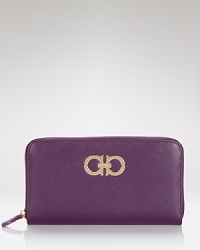 Salvatore Ferragamo's ever-chic wallet gets prettier in Saffiano leather. Eight credit card pockets add practicality, while the brand's signature hardware is a luxurious touch. Salvatore Ferragamo's ever-chic wallet gets prettier in Saffiano leather. Eight credit card pockets add practicality, while the brand's signature hardware is a luxurious touch.