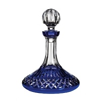 This grand Waterford decanter updates the dazzling crosshatch Lismore pattern in regal cobalt and clear crystal. This grand Waterford decanter updates the dazzling crosshatch Lismore pattern in regal cobalt and clear crystal.