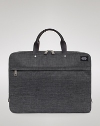 Comport yourself with the casual distinction of Jack Spade when you carry this cool and classic brief, furnished with a laptop compartment inside to hold your valuable hardware. Comport yourself with the casual distinction of Jack Spade when you carry this cool and classic brief, furnished with a laptop compartment inside to hold your valuable hardware.