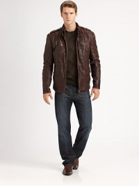 A key wardrobe essential, this classic leather jacket exudes sharp tailoring and attention to detail, featuring shoulder epaulettes and an array of front zip pockets.Two-way zip frontStand collarShoulder epaulettesChest, waist zip pocketsFully linedAbout 27 from shoulder to hemLeatherDry cleanImported A key wardrobe essential, this classic leather jacket exudes sharp tailoring and attention to detail, featuring shoulder epaulettes and an array of front zip pockets.Two-way zip frontStand collarShoulder epaulettesChest, waist zip pocketsFully linedAbout 27 from shoulder to hemLeatherDry cleanImported