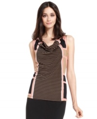 A contrasting print frames the side of this cowlneck top from Calvin Klein--a perfect layering piece for work! A contrasting print frames the side of this cowlneck top from Calvin Klein--a perfect layering piece for work!