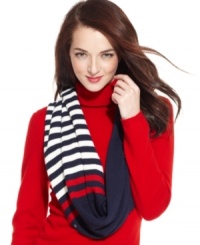 When it comes to winter accessorizing, show your stripes, like with this preppy-chic infinity scarf from Tommy Hilfiger. It wraps up any look in an instant. When it comes to winter accessorizing, show your stripes, like with this preppy-chic infinity scarf from Tommy Hilfiger. It wraps up any look in an instant.