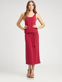 Utterly flattering, this sleeveless dress features a feminine neckline, an elasticized dropped waist and a self-tie belt.U-neckSleevelessDropped waistSelf-tie beltSide slitsAbout 37 from natural waist94% polyester/6% spandexMachine washImported Model shown is 5'10 (177cm) wearing US size Small. Utterly flattering, this sleeveless dress features a feminine neckline, an elasticized dropped waist and a self-tie belt.U-neckSleevelessDropped waistSelf-tie beltSide slitsAbout 37 from natural waist94% polyester/6% spandexMachine washImported Model shown is 5'10 (177cm) wearing US size Small.