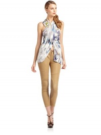 THE LOOKAllover abstract printAsymmetric neckRuching, alloverAsymmetric wrap-style frontPullover styleTHE FITAbout 33 from shoulder to hemTHE MATERIAL94% viscose/6% spandexCARE & ORIGINDry cleanMade in USAModel shown is 5'10 (177cm) wearing US size 4. THE LOOKAllover abstract printAsymmetric neckRuching, alloverAsymmetric wrap-style frontPullover styleTHE FITAbout 33 from shoulder to hemTHE MATERIAL94% viscose/6% spandexCARE & ORIGINDry cleanMade in USAModel shown is 5'10 (177cm) wearing US size 4.