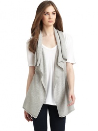 THE LOOKSleevelessDraped collarOpen frontRolled hemTHE FITAbout 28 from shoulder to hemTHE MATERIALCashmereCARE & ORIGINDry cleanImportedModel shown is 5'8½ (174cm) wearing US size Small. THE LOOKSleevelessDraped collarOpen frontRolled hemTHE FITAbout 28 from shoulder to hemTHE MATERIALCashmereCARE & ORIGINDry cleanImportedModel shown is 5'8½ (174cm) wearing US size Small.
