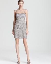 A sparkling beaded bodice tops off a skirt of dimensional petals on this party-ready Sue Wong dress. A sparkling beaded bodice tops off a skirt of dimensional petals on this party-ready Sue Wong dress.