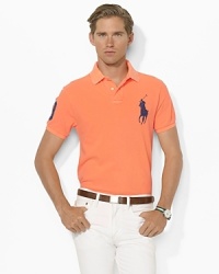 Ralph Lauren's iconic Big Pony and an applied twill 3 on a vibrant custom-fitting polo bring modern athletic accents to a classic look. Ralph Lauren's iconic Big Pony and an applied twill 3 on a vibrant custom-fitting polo bring modern athletic accents to a classic look.