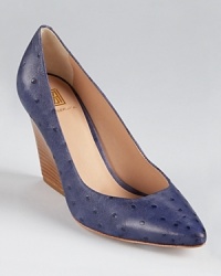 A chunky stacked heel and sharply pointed toe are a study in proportion--Pour La Victoire's smart Aisha pumps lend a polished look. A chunky stacked heel and sharply pointed toe are a study in proportion--Pour La Victoire's smart Aisha pumps lend a polished look.