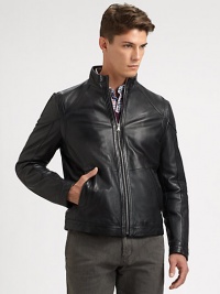 Structured and edgy, crafted in supple lambskin leather with concealed snaps, shoulder and elbow details.Zip frontStand collarSide slash pocketsAbout 25 from shoulder to hemLeatherDry cleanImported Structured and edgy, crafted in supple lambskin leather with concealed snaps, shoulder and elbow details.Zip frontStand collarSide slash pocketsAbout 25 from shoulder to hemLeatherDry cleanImported