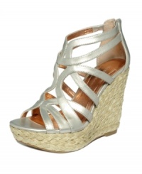 Throw a curve ball to your warm-weather wardrobe with the Makala sandals by BCBGeneration. Curving metallic straps, a zippered back and woven espadrille wedge are a home run. Throw a curve ball to your warm-weather wardrobe with the Makala sandals by BCBGeneration. Curving metallic straps, a zippered back and woven espadrille wedge are a home run.