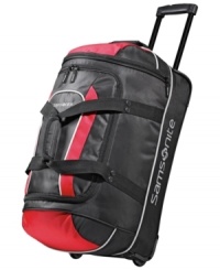 Stay on the move. This rolling duffel is crafted from a highly durable polyester and protected by end bumpers and bottom runners for a long-lasting presence that maneuvers trip after trip with incredible ease. The perfect size for last-minute getaways, this duffel features an easy-access exterior zip pocket and a spacious ready-to-pack interior. Stay on the move. This rolling duffel is crafted from a highly durable polyester and protected by end bumpers and bottom runners for a long-lasting presence that maneuvers trip after trip with incredible ease. The perfect size for last-minute getaways, this duffel features an easy-access exterior zip pocket and a spacious ready-to-pack interior.