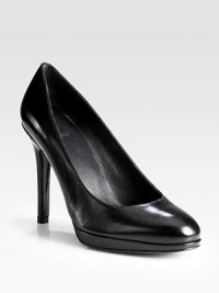 True leather classics are designed for wear-with-all versatility and comfort.Self-covered heel, 4 (100mm)Covered platform, ½ (15mm)Compares to a 3½ heel (90mm)Leather upperLeather lining and solePadded insoleMade in Spain True leather classics are designed for wear-with-all versatility and comfort.Self-covered heel, 4 (100mm)Covered platform, ½ (15mm)Compares to a 3½ heel (90mm)Leather upperLeather lining and solePadded insoleMade in Spain