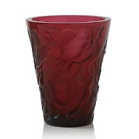 The vase is a stunning contrast of matte and re-polished surfaces, unique to the Lalique brand. In addition, the raised pattern of the design is enhanced by the magnification of the crystal and can be seen perfectly on the outside as well as on the inside of the vase.