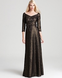 David Meister's sophisticated lace gown lends subtle sparkle in metallic lace. David Meister's sophisticated lace gown lends subtle sparkle in metallic lace.