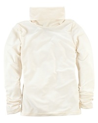 A classic turtleneck is rendered in ultra-soft stretch cotton jersey with a high ruched collar that can be folded or scrunched. A classic turtleneck is rendered in ultra-soft stretch cotton jersey with a high ruched collar that can be folded or scrunched.
