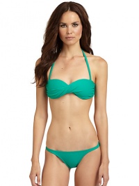 THE LOOKPadded bandeau style with twisted frontRemovable halter strapBack tie closureTHE MATERIAL85% nylon/15% spandexFully linedCARE & ORIGINHand washImportedPlease note: Bikini bottom sold separately. THE LOOKPadded bandeau style with twisted frontRemovable halter strapBack tie closureTHE MATERIAL85% nylon/15% spandexFully linedCARE & ORIGINHand washImportedPlease note: Bikini bottom sold separately.