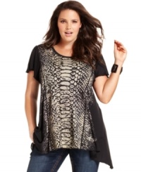 Give your look a bit of bite with Seven7 Jeans' short sleeve plus size top, flaunting a snakeskin print. Give your look a bit of bite with Seven7 Jeans' short sleeve plus size top, flaunting a snakeskin print.