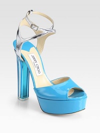 A towering plexi heel lifts this patent silhouette topped with metallic leather crisscrossed straps. Plexi heel, 5½ (140mm)Patent leather-covered platform, 1½ (40mm)Compares to a 4 heel (100mm)Patent and metallic leather upperAdjustable metallic leather ankle strapLeather lining and solePadded insoleMade in Italy A towering plexi heel lifts this patent silhouette topped with metallic leather crisscrossed straps. Plexi heel, 5½ (140mm)Patent leather-covered platform, 1½ (40mm)Compares to a 4 heel (100mm)Patent and metallic leather upperAdjustable metallic leather ankle strapLeather lining and solePadded insoleMade in Italy