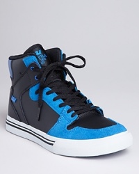 Classic high top design perched atop a authentic vulcanized sole, with blue perforation on the sides and a padded collar providing superior ankle support and comfort. Classic high top design perched atop a authentic vulcanized sole, with blue perforation on the sides and a padded collar providing superior ankle support and comfort.