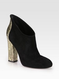 A textured metallic leather heel redefines this low-cut suede silhouette. Textured metallic leather heel, 4½ (115mm)Suede and metallic leather upperPull-on styleLeather lining and solePadded insoleImported A textured metallic leather heel redefines this low-cut suede silhouette. Textured metallic leather heel, 4½ (115mm)Suede and metallic leather upperPull-on styleLeather lining and solePadded insoleImported
