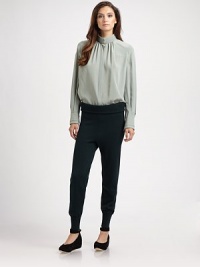A dramatic, sculptural stand collar anchors this artfully tailored piece.Ribbed stand collarNeckline gathersConcealed button frontLong pleated sleeves with button cuffsInverted back pleatAbout 24 from shoulder to hemPolyesterDry cleanImportedModel shown is 5'10 (177cm) wearing US size 4. A dramatic, sculptural stand collar anchors this artfully tailored piece.Ribbed stand collarNeckline gathersConcealed button frontLong pleated sleeves with button cuffsInverted back pleatAbout 24 from shoulder to hemPolyesterDry cleanImportedModel shown is 5'10 (177cm) wearing US size 4.