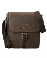 Keep all your necessities convenient while you stay hands-free with this leather-trimmed bag from Fossil. Keep all your necessities convenient while you stay hands-free with this leather-trimmed bag from Fossil.