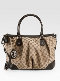 Iconic GG jacquard, softly pleated in a roomy carryall finished with rich leather trim.Double top handles, 6 dropDetachable adjustable shoulder strap, 18¼-19 dropTop zip closureOne inside zip pocketTwo inside open pocketsLinen lining12¼W X 10¾H X 7DMade in Italy Iconic GG jacquard, softly pleated in a roomy carryall finished with rich leather trim.Double top handles, 6 dropDetachable adjustable shoulder strap, 18¼-19 dropTop zip closureOne inside zip pocketTwo inside open pocketsLinen lining12¼W X 10¾H X 7DMade in Italy