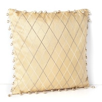 With a luminous argyle print and golden tassel fringe, this Waterford decorative pillow adds a regal note to the Kelsey bedding collection. With a luminous argyle print and golden tassel fringe, this Waterford decorative pillow adds a regal note to the Kelsey bedding collection.
