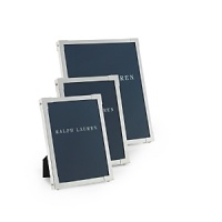 A classic display for a treasured image, this elegant Ralph Lauren photo frame boasts sleek lines and corner brackets. Presented in a gift box. A classic display for a treasured image, this elegant Ralph Lauren photo frame boasts sleek lines and corner brackets. Presented in a gift box.
