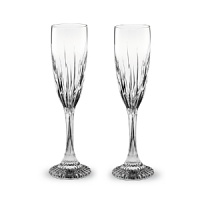 Beveled cuts of varying heights add grandeur to Baccarat's Juputer Champagne flutes. Beveled cuts of varying heights add grandeur to Baccarat's Juputer Champagne flutes.