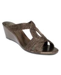 Metallic roped straps give the Aquaria sandals by Bandolino a sense of shine, while the covered wedge heel adds just enough height. Metallic roped straps give the Aquaria sandals by Bandolino a sense of shine, while the covered wedge heel adds just enough height.