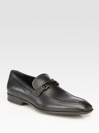 Timeless slip-on articulated in sleek calfskin with iconic gancini ornament.Calfskin upperLeather liningPadded insoleLeather soleMade in Italy Timeless slip-on articulated in sleek calfskin with iconic gancini ornament.Calfskin upperLeather liningPadded insoleLeather soleMade in Italy