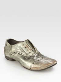 Easy slip-on style in distressed metallic leather with intricate perforated details. Metallic leather upperLeather lining and solePadded insoleMade in Italy Easy slip-on style in distressed metallic leather with intricate perforated details. Metallic leather upperLeather lining and solePadded insoleMade in Italy