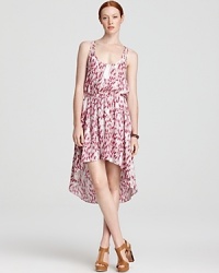 Boast bohemian, concert-going style in a BCBGeneration dress, blooming with a floral print and cutout back for a cool summer.. The high/low hem is summer's freshest trend, so show off your legs with heels. Boast bohemian, concert-going style in a BCBGeneration dress, blooming with a floral print and cutout back for a cool summer.. The high/low hem is summer's freshest trend, so show off your legs with heels.