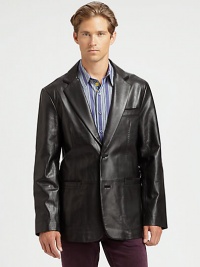 A classic silhouette makes a handsome first impression, and this tailored jacket is no exception. Structured in lustrous, lambskin leather with expert stitch detail across the body.Button-frontNotch lapelChest, waist welt pocketsRear ventAbout 31 from shoulder to hemLeatherDry cleanImported A classic silhouette makes a handsome first impression, and this tailored jacket is no exception. Structured in lustrous, lambskin leather with expert stitch detail across the body.Button-frontNotch lapelChest, waist welt pocketsRear ventAbout 31 from shoulder to hemLeatherDry cleanImported