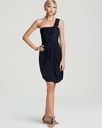 Youthful without lacking in elegance, this BCBGMAXAZRIA one-shoulder dress flaunts a cascading ruffle for a touch of romance. Youthful without lacking in elegance, this BCBGMAXAZRIA one-shoulder dress flaunts a cascading ruffle for a touch of romance.