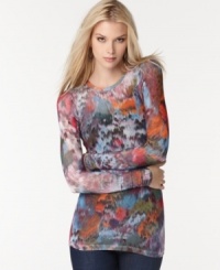 Add a burst of color to your casual lineup with BCBGMAXAZRIA's long sleeve top, flaunting an abstract print. Add a burst of color to your casual lineup with BCBGMAXAZRIA's long sleeve top, flaunting an abstract print.