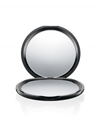 A slim, glossy MAC black round compact featuring two mirrors. One side magnifies for close-ups, the other provides a standard true-to-life image. Flexible in use: props up, lies flat Pops easily into kit, bag or pocket.