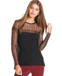 Sheer lace insets add a modern edge to this BCBGMAXAZRIA top -- perfect for a cool, casual look! Sheer lace insets add a modern edge to this BCBGMAXAZRIA top -- perfect for a cool, casual look!