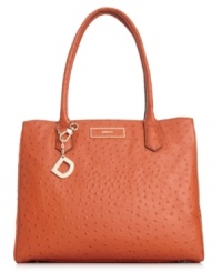 It's business critical to look fashioista fabulous, and this roomy carryall from DKNY gets the job done. Luxe ostrich-embossed leather is accented with golden hardware, while the sized-right shape totes all your 9-to-5 essentials with ease. It's business critical to look fashioista fabulous, and this roomy carryall from DKNY gets the job done. Luxe ostrich-embossed leather is accented with golden hardware, while the sized-right shape totes all your 9-to-5 essentials with ease.