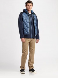 The classic puffer vest, tailored with signature Hugo Boss piping and contrast insets.Zip frontZipper pocketFully linedAbout 26 from shoulder to hemCottonMachine washImported The classic puffer vest, tailored with signature Hugo Boss piping and contrast insets.Zip frontZipper pocketFully linedAbout 26 from shoulder to hemCottonMachine washImported