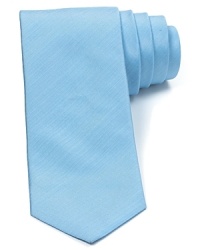 Plush Italian silk and soft cotton are woven to create an understated tonal stripe pattern on this handsome skinny width tie from HUGO.