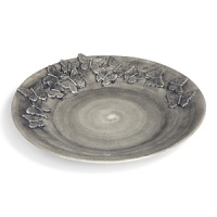 Delicate butterflies dance across this handmade fruit platter, highlighted by subtle variations in coloring. Delicate butterflies dance across this handmade fruit platter, highlighted by subtle variations in coloring.