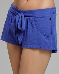 Soft pajama shorts with large tie detail and pockets at front. Soft pajama shorts with large tie detail and pockets at front.