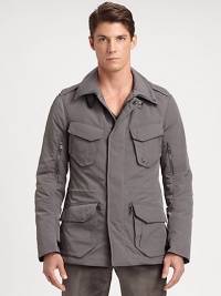 This jacket is skillfully crafted in a slim, contemporary silhouette from water-repellent microfiber for a modern, utilitarian-inspired vibe.Zip frontStand collarShoulder epaulettesOversized chest, waist flap pocketsZippered pockets at sleeveFully linedAbout 31 from shoulder to hem90% polyester/10% polyurethaneDry cleanImported