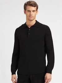 A comfy, fine-knit wool sweater, updated with a point collar button placket.Point collarThree-button placketLong sleeves with ribbed cuffsRibbed hemMerino woolDry cleanImported A comfy, fine-knit wool sweater, updated with a point collar button placket.Point collarThree-button placketLong sleeves with ribbed cuffsRibbed hemMerino woolDry cleanImported
