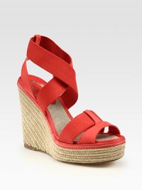 Traditional espadrille wedge and platform adds a touch of texture while stretchy elastic and satin weave around the foot. Braided hemp wedge, 4½ (115mm)Braided hemp platform, 1 (25mm)Compares to a 3½ heel (90mm)Elastic and satin upperLinen liningLeather solePadded insoleImportedOUR FIT MODEL RECOMMENDS ordering one half size up as this style runs small. Traditional espadrille wedge and platform adds a touch of texture while stretchy elastic and satin weave around the foot. Braided hemp wedge, 4½ (115mm)Braided hemp platform, 1 (25mm)Compares to a 3½ heel (90mm)Elastic and satin upperLinen liningLeather solePadded insoleImportedOUR FIT MODEL RECOMMENDS ordering one half size up as this style runs small.